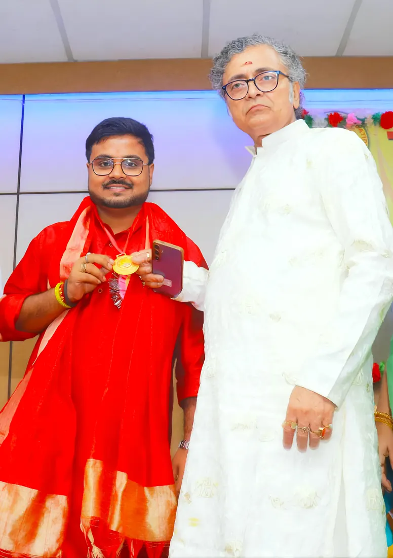 Receiving the gold medal